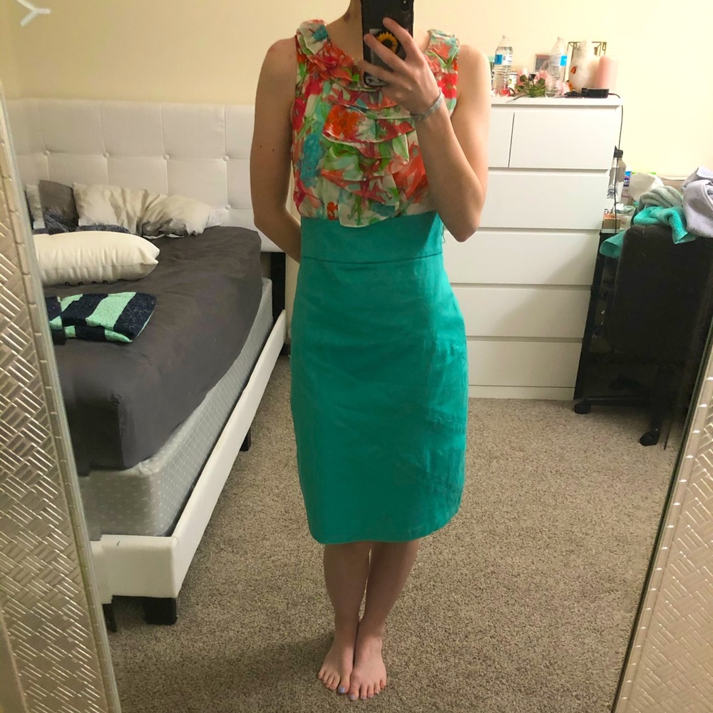 Teal knee-length dress with ruffles